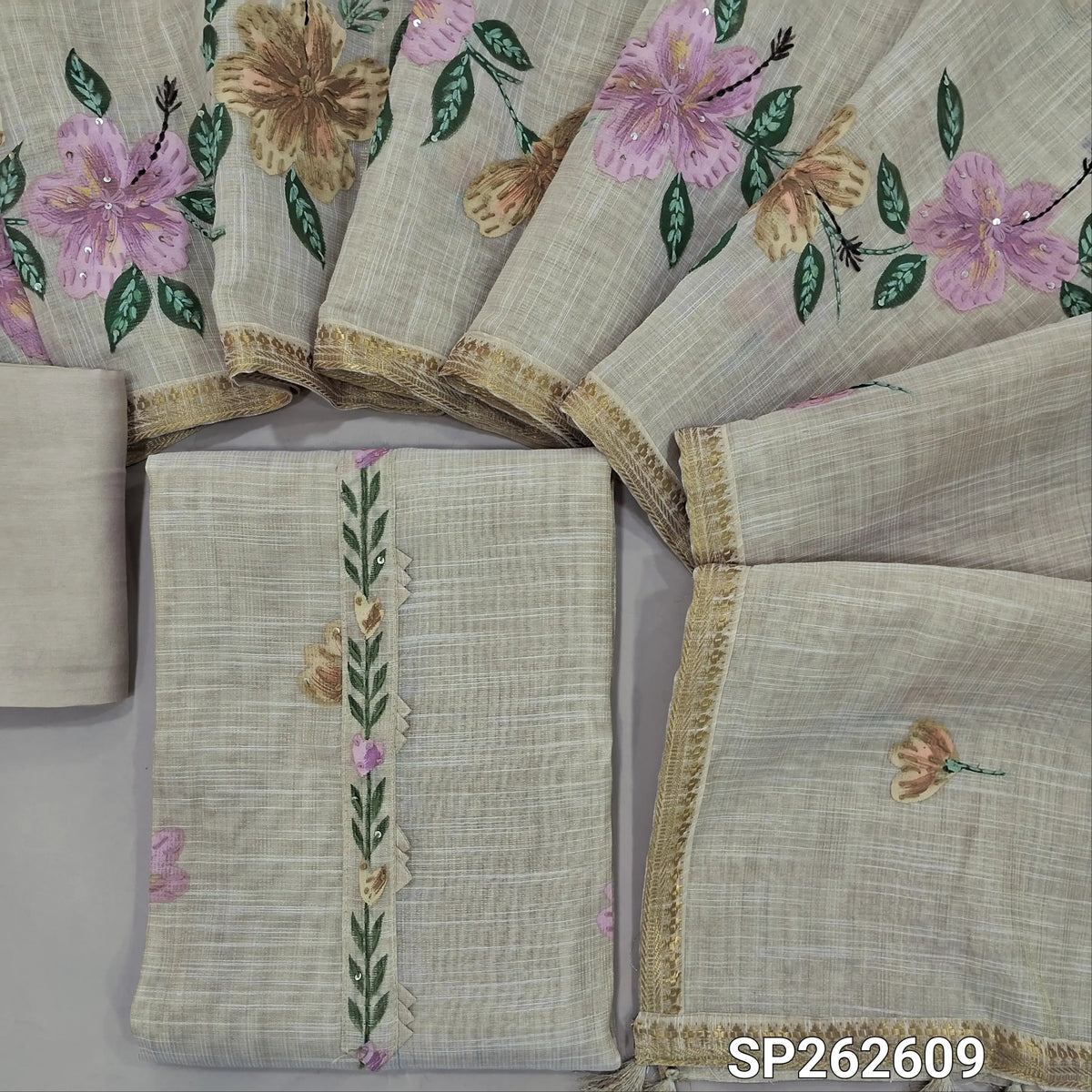 Rich beige with golden tint pure tissue linen unstitched salwar material,printed yoke with hand embroidery, brush paint on front, (lining needed)santoon bottom,(PINK)brush painted and hand embroidery on  tissue linen dupatta with zari borders. SP262609