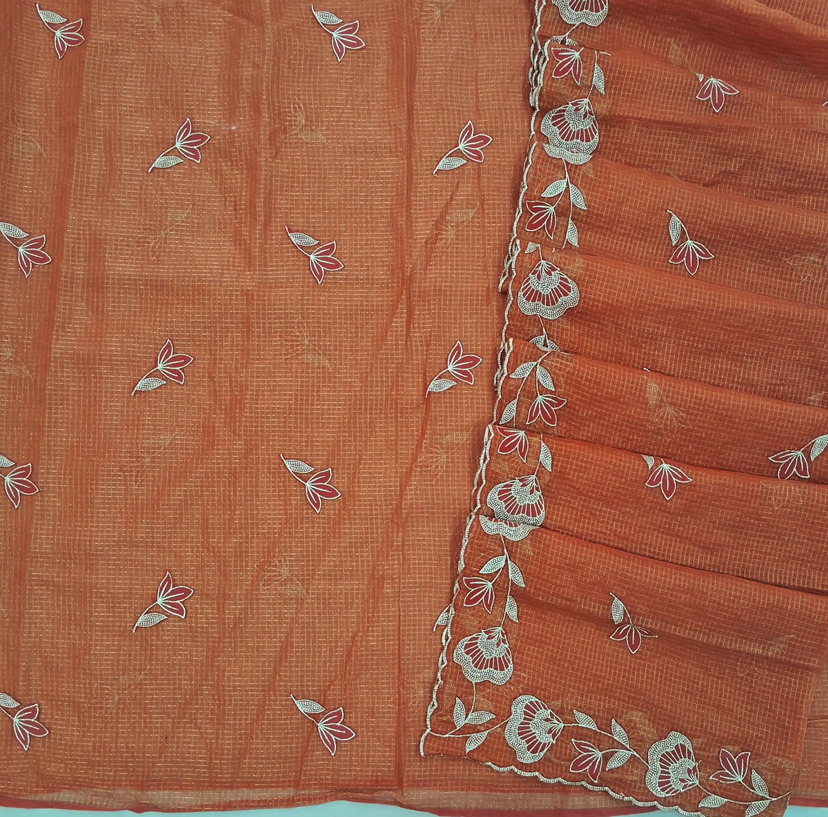 PRE ORDER SHIPPING AFTER 1 WEEK Peachish pink with golden tint tissue chanderi kota unstitched salwar material,applique work & zari checks all over, (lining needed)NO BOTTOM,applique work on tissue chanderi kota dupatta with rich borders. SP262702