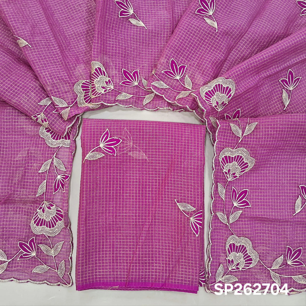 PRE ORDER SHIPPING AFTER 1 WEEK Purplish pink with golden tint tissue chanderi kota unstitched salwar material,applique work & zari checks all over, (lining needed)NO BOTTOM,applique work on tissue chanderi kota dupatta with rich borders. SP262704