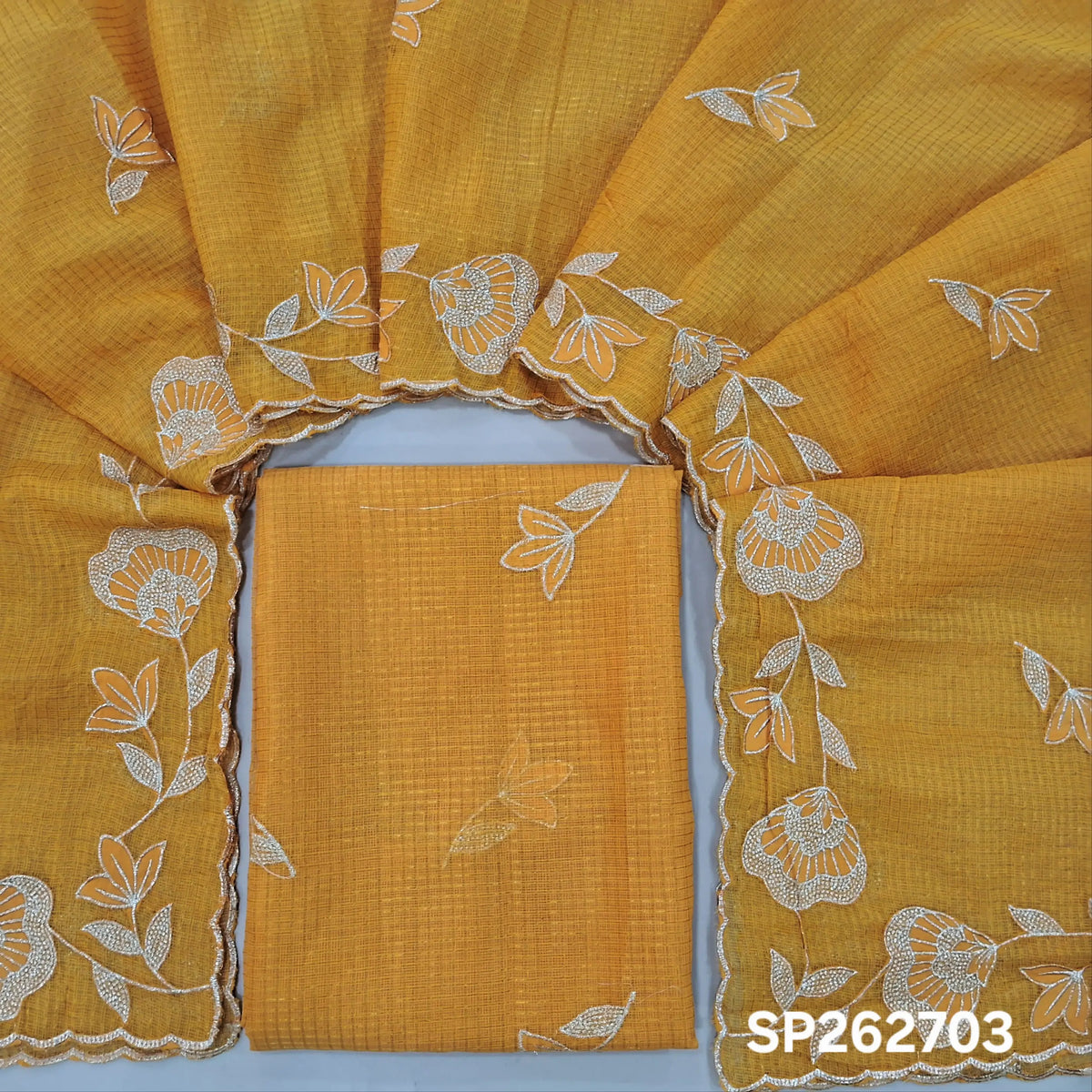 PRE ORDER SHIPPING AFTER 1 WEEK Yellow with golden tint tissue chanderi kota unstitched salwar material,applique work & zari checks all over, (lining needed)NO BOTTOM,applique work on tissue chanderi kota dupatta with rich borders. SP262703