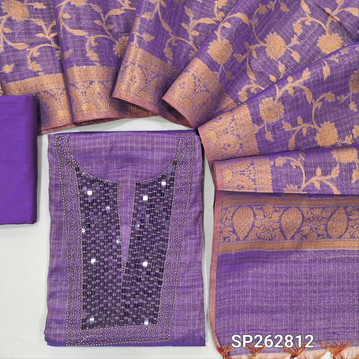 Purple with golden tint tissue silk cotton unstitched salwar material,sugar bead and sequins on yoke,(lining needed)silk cotton bottom,zari weaving on tissue silk cotton dupatta with borders. SP262812