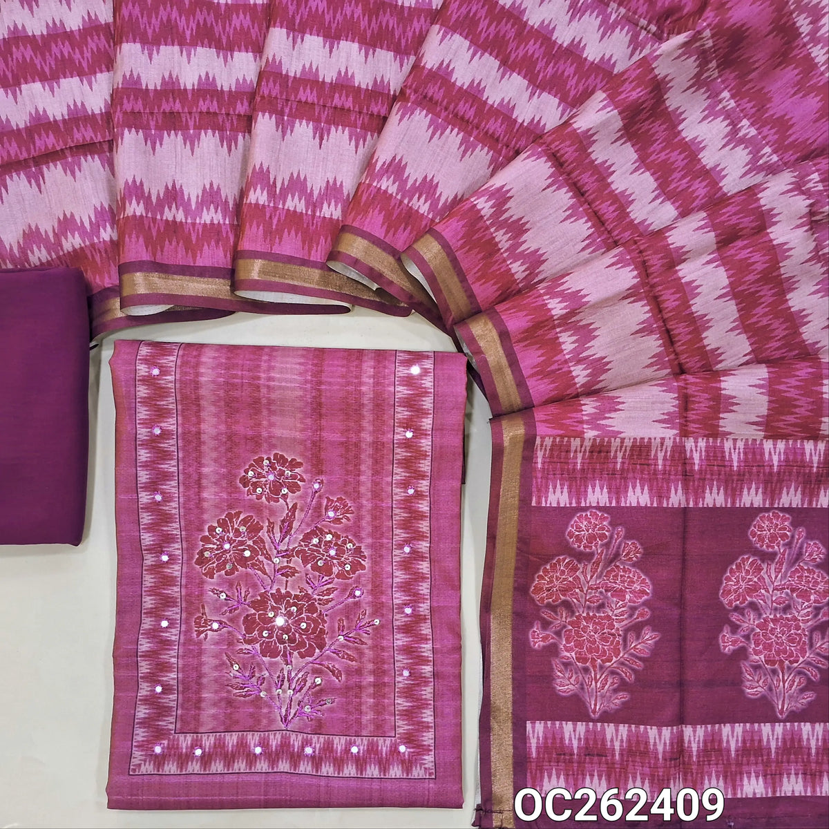 Pink semi gicha unstitched salwar material, floral design with faux miror and thread work on yoke,(thin fabric, lining needed)spun cotton bottom, digital printed semi gicha dupatta with tissue borders. OC262409