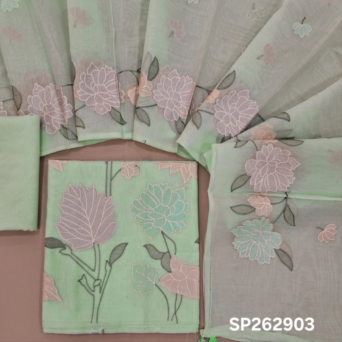 Sea green premium chanderi silk cotton unstitched salwar material,embroidery work on front, rich daman,(lining needed)silk cotton bottom, embroidery on chanderi silk cotton dupatta with rich floral design borders & tassles. SP262903