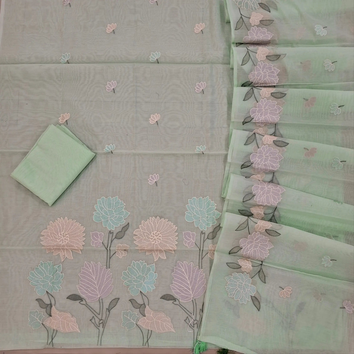 Sea green premium chanderi silk cotton unstitched salwar material,embroidery work on front, rich daman,(lining needed)silk cotton bottom, embroidery on chanderi silk cotton dupatta with rich floral design borders & tassles. SP262903