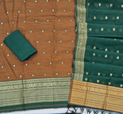 Honey brown premium silk cotton unstitched salwar material,buttas all over benarasi zari weaving daman, (lining needed)bottle green  silky bottom,buttas on dual shaded silk cotton dupatta with rich pallu and borders. SP262917