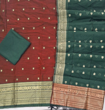 Dark maroon premium silk cotton unstitched salwar material,buttas all over benarasi zari weaving daman, (lining needed)bottle green  silky bottom,buttas on dual shaded silk cotton dupatta with rich pallu and borders. SP262915