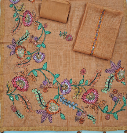Dark peach with golden tint pure tissue linen unstitched salwar material,floral design with french knot & sequins work on yoke ( light weight,lining needed)santoon bottom,applique work on pure tissue linen dupatta with zari woven borders. SP262805