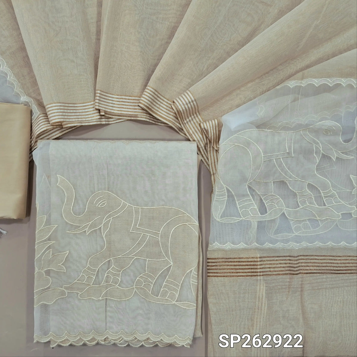 Beige with golden tint tissue silk cotton unstitched salwar material,organza daman with applique work(thin, lining needed)silk cotton bottom, tissue silk cotton dupatta with organza pallu with applique work. SP262922