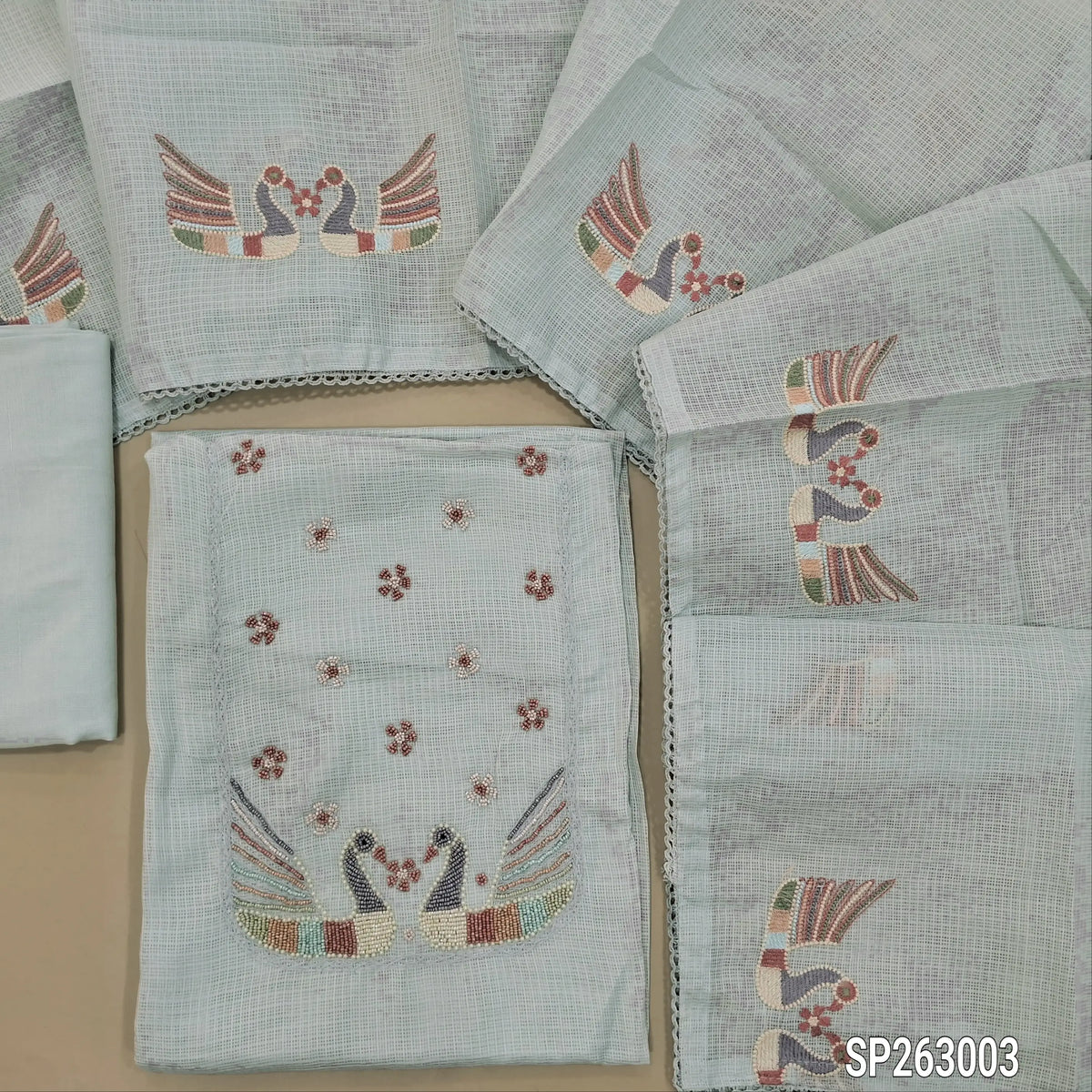 Light greyish blue kota unstitched salwar material,embroidery work with bead work ,lace detailing  and thread work on yoke,(Lining Needed)spun cotton bottom, embroidery work on kota dupatta. SP263003