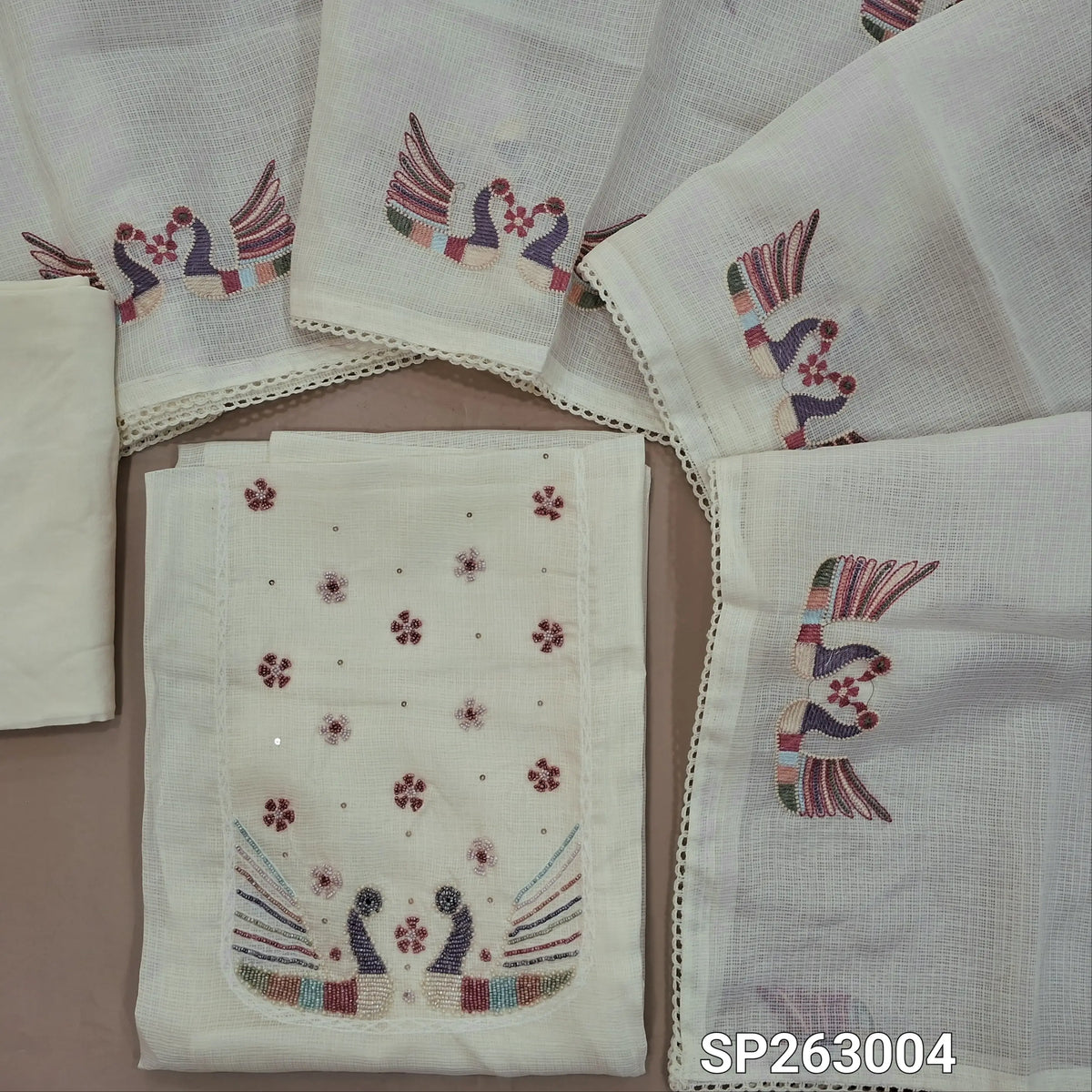 Off white kota unstitched salwar material,embroidery work with bead work ,lace detailing  and thread work on yoke,(Lining Needed)spun cotton bottom, embroidery work on kota dupatta. SP263004