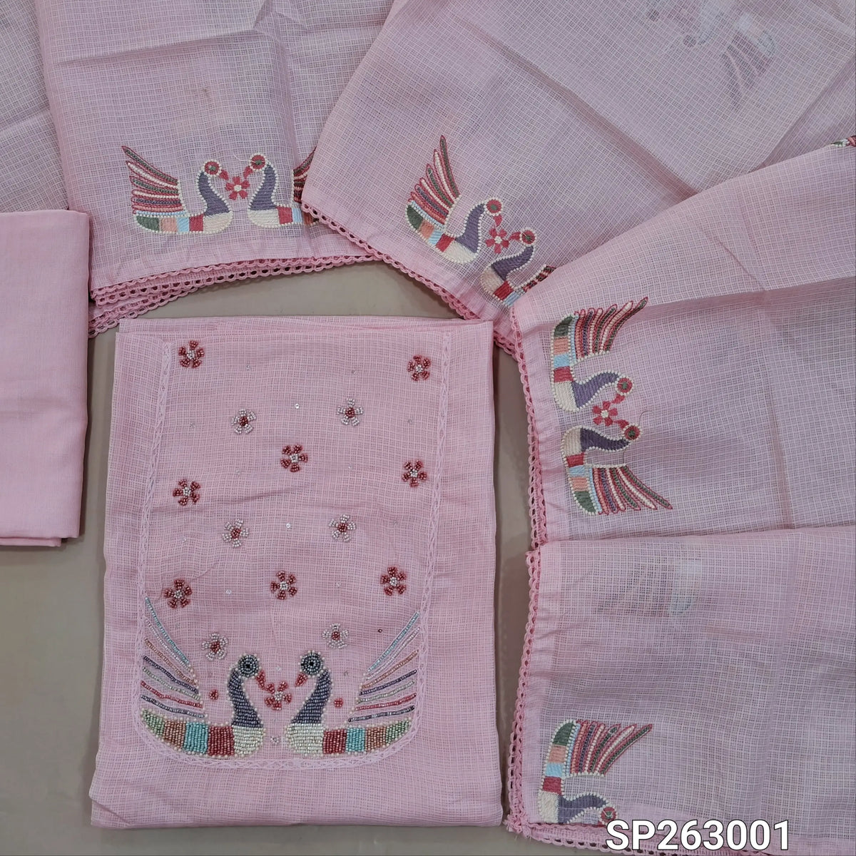 Pastel pink kota unstitched salwar material,embroidery work with bead work ,lace detailing  and thread work on yoke,(Lining Needed)spun cotton bottom, embroidery work on kota dupatta. SP263001