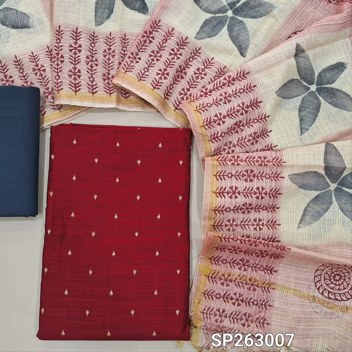 Reddish maroon slub silk cotton unstitched salwar material, thread woven buttas on front,(lining needed)dark grey cotton bottom,hand block printed kota silk cotton dupatta with tissue borders. SP263007