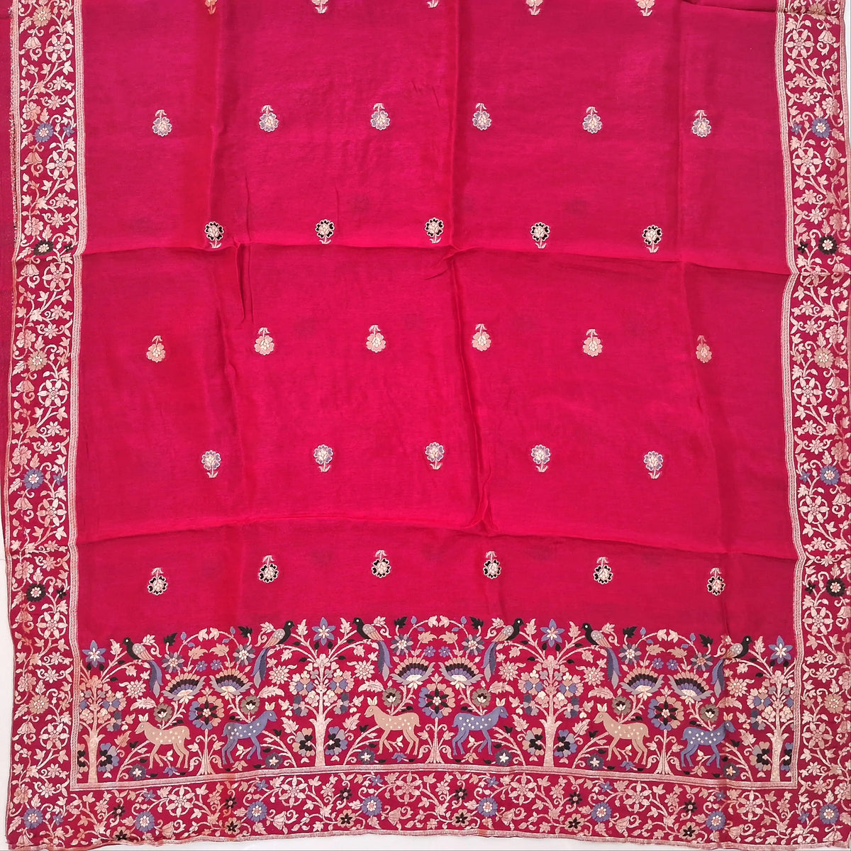 Dark pink pure uppada silk unstitched salwar material, (lining needed)round neck, thread weaving and zari woven, real mirror work on yoke,rich daman border,matching santoon bottom,pure uppada silk with rich Meenakari weaving dupatta with pallu. SP263012
