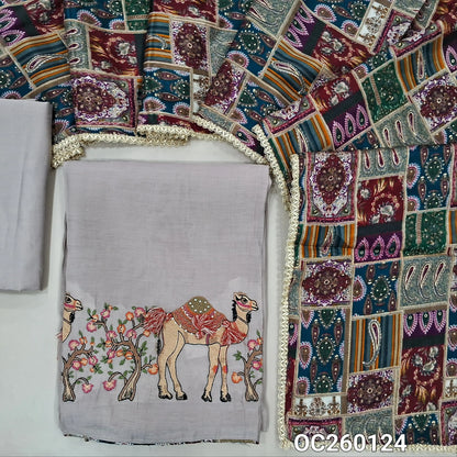 Light greyish beige mul chanderi unstitched salwar material,printed taping & tassles on yoke,camel design with embroidery on daman,( lining needed)silk cotton bottom, multicoloured digital printed crinkled chinon silk dupatta with lace tapping. OC260124