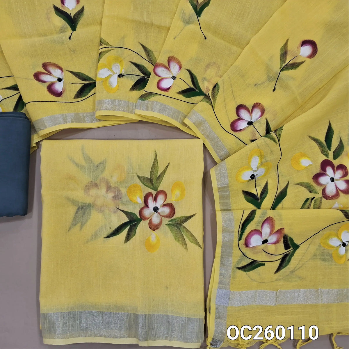 Pastel yellow pure linen cotton salwar material,brush paint on front,(lining needed)dark grey cotton bottom, brush paint work on linen cotton dupatta with  borders(DRY CLEAN RECOMMENDED, SLIGHT PAINT STAINS ARE NOT CONSIDERED AS DEFECTS). OC260110