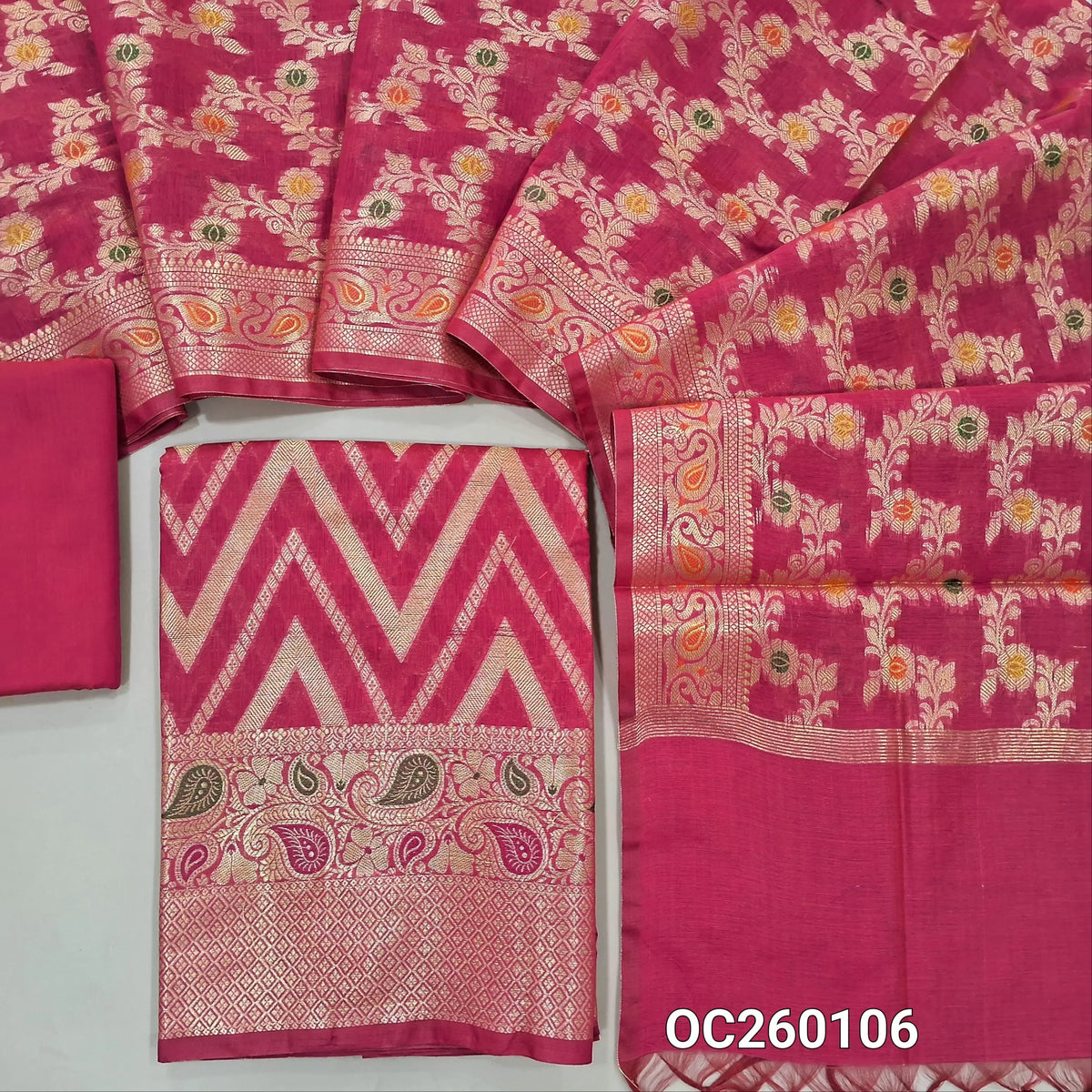 Bright pink premium benarasi silk cotton unstitched salwar material,rich weaving all over, rich meenakari & weaving daman,(lining needed) silk cotton bottom,rich weaving & meenakari on  soft silk cotton dupatta with borders. OC260106