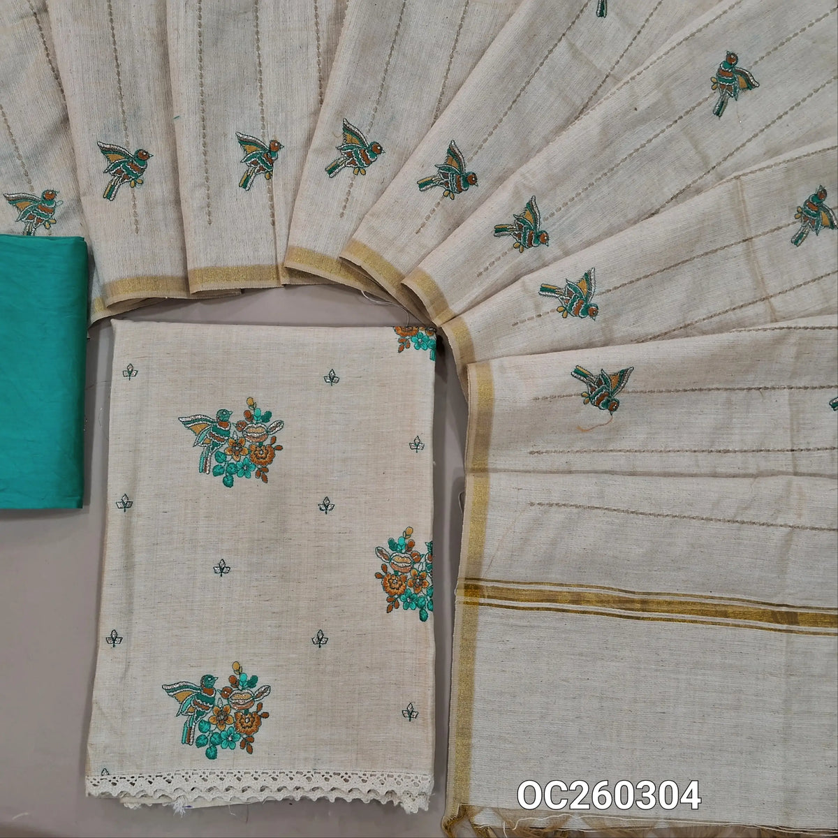 Off white base raw silk unstitched salwar material,bird embroidery on front,(lining needed)blue silky bottom, vertical stitch work,bird and zari detailing on raw silk dupatta. OC260304