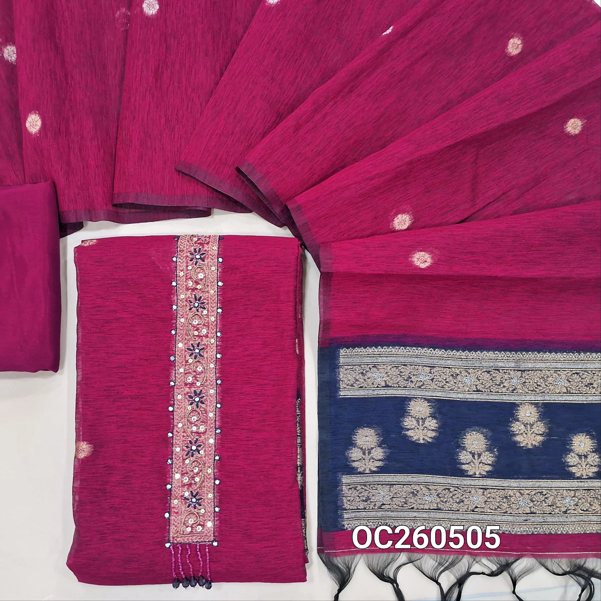 Rani pink premium tussar unstitched salwar material,thread, zarodzi and  faux mirror work on yoke,gold and silver zari buttas all over, rich weaving daman,(lining needed)santoon bottom, buttas on tussar dupatta with rich contrast pallu. OC260505