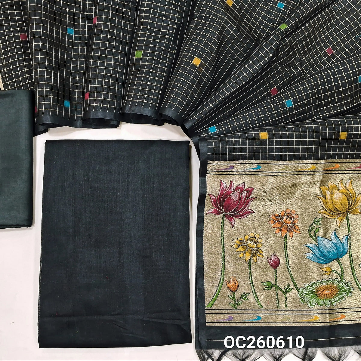 Black premium silk cotton unstitched salwar material,(lining needed)matching silky bottom, zari checks with thread woven buttas on silk cotton dupatta with tissue pallu with rich weaving. OC260610