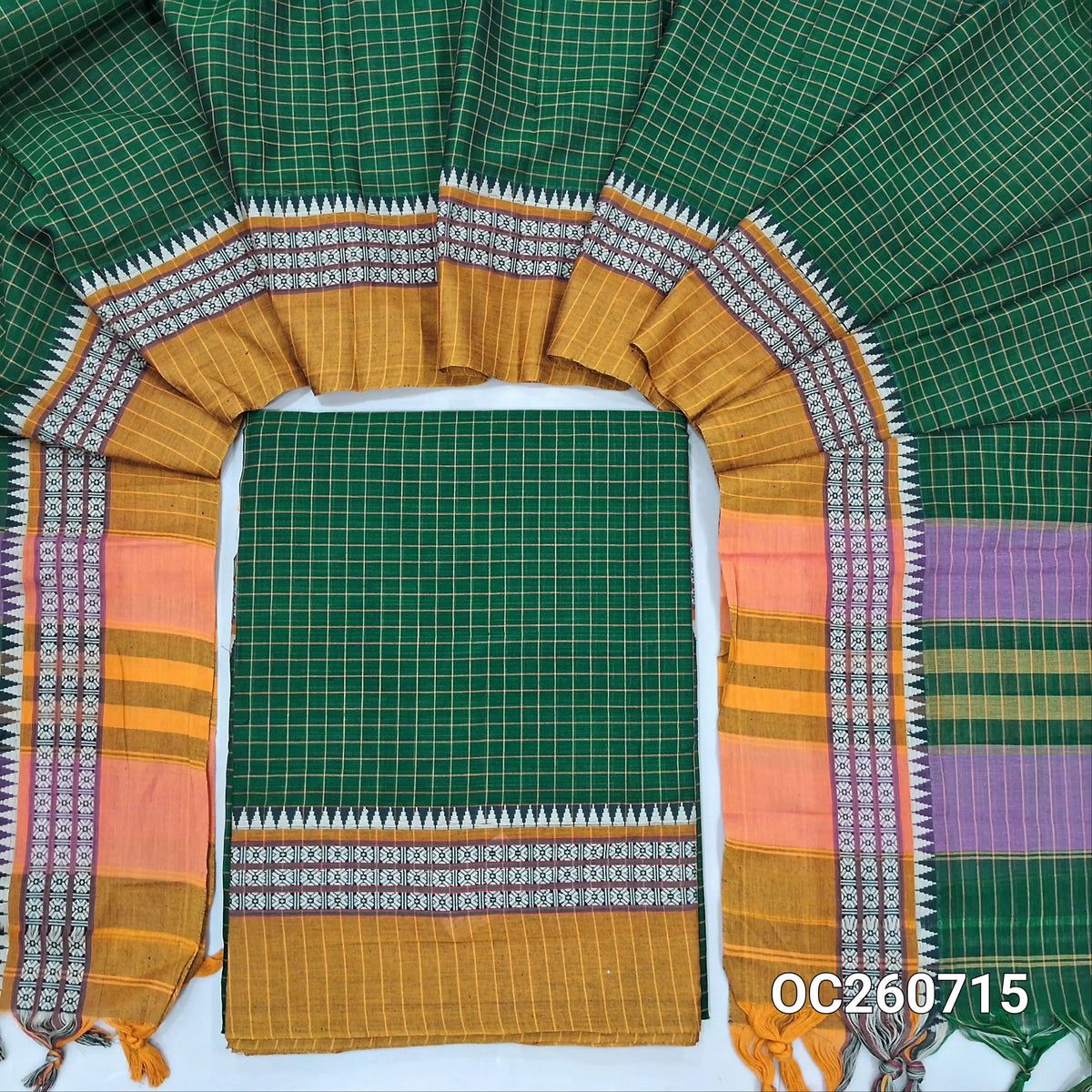 Bottle green mercerized handloom cotton unstitched salwar material(lining needed)checked all over with contrast traditional thread woven border, bottom included with top,checked mercerized handloom cotton dupatta with contrast borders and pallu. OC260715