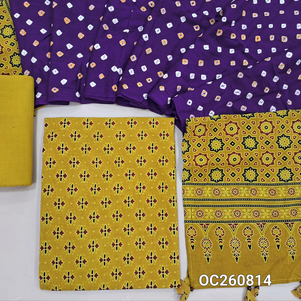 Mehandhi yellow ajrak block printed pure cotton unstitched salwar material(lining optional)cotton bottom, original tie and dye work on satin cotton dupatta with ajrak pallu and handmade tassles. OC260814