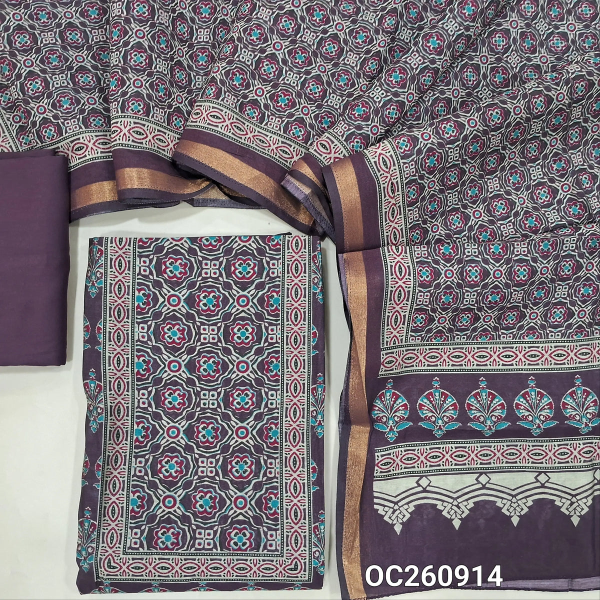 Deep wine purple printed silk cotton unstitched salwar material,ajrak printed yoke and daman, (lining needed)spun cotton bottom, printed full length soft silk cotton dupatta with zari woven borders. OC260914