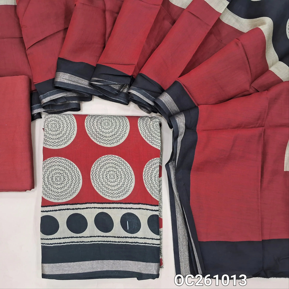 Reddish maroon digital printed silk cotton unstitched salwar material,polka design all over,(lining needed)spun cotton bottom, digital printed soft silk cotton dupatta with zari woven borders. OC261013