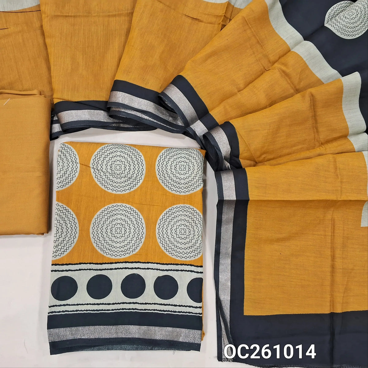 Yellow digital printed silk cotton unstitched salwar material,polka design all over,(lining needed)spun cotton bottom, digital printed soft silk cotton dupatta with zari woven borders. OC261014