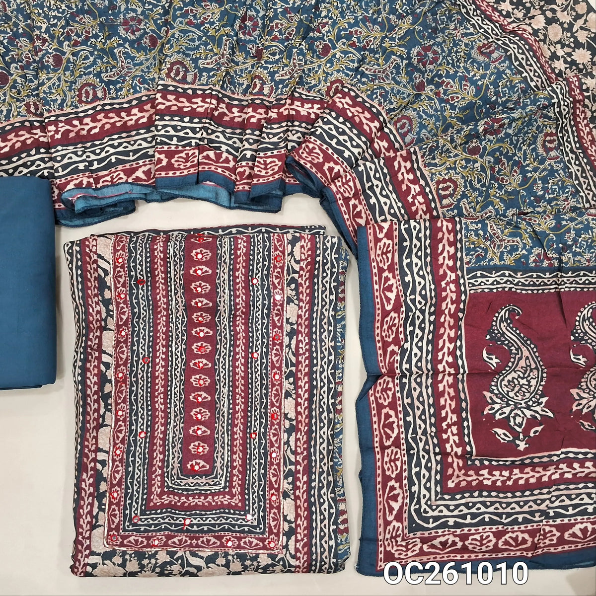 Dark blue base maslin silk digital printed unstitched salwar material, printed yoke with faux mirror,panel design (Soft, Lining Needed)spun cotton bottom,printed maslin silk dupatta with pallu. OC261010