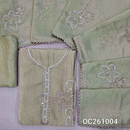 Sage green with golden tint pure crinkled tissue organza silk unstitched salwar material,rich bead and zarodzi work on yoke and front,(lining needed)santoon bottom,rich bead work on crinkled tissue silk cotton dupatta with lace tapping. OC261004