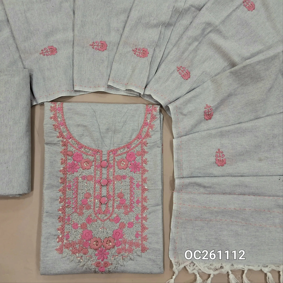 Light grey spun cotton unstitched salwar material,thread embroidery and sequins on yoke,(lining needed)spun cotton bottom, floral embroidery work on spun cotton dupatta with kantha stitch borders. OC261112
