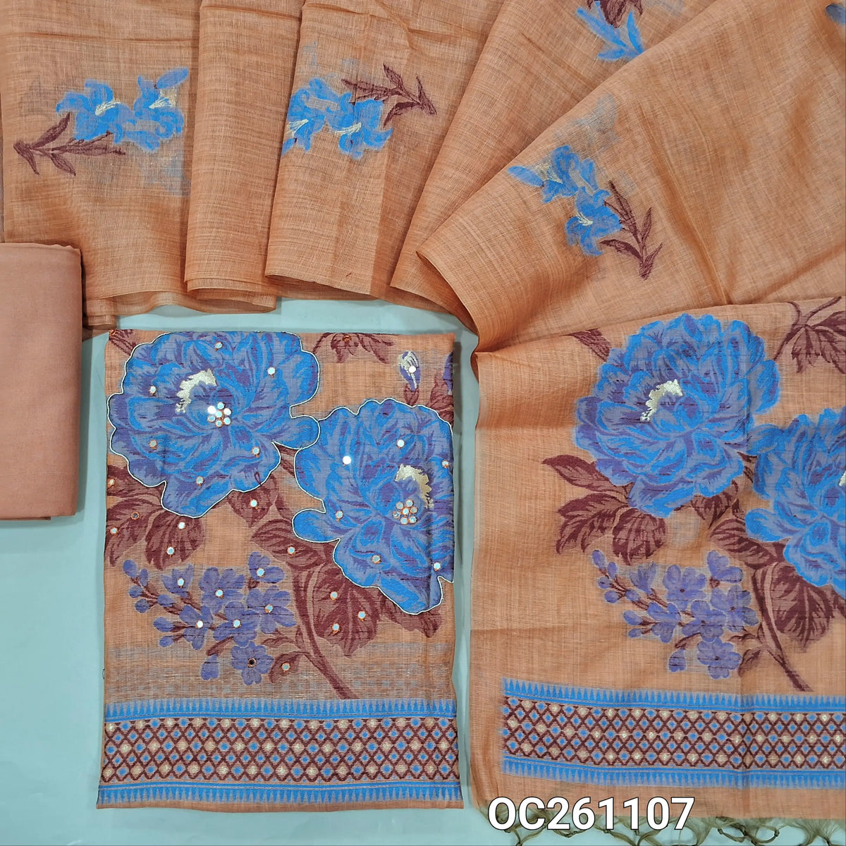 Peach silk cotton unstitched salwar material,thread weaving with zarodzi and sequins work on front(lining needed)santoon bottom, full length silk cotton dupatta with rich weaving work on corner. OC261107