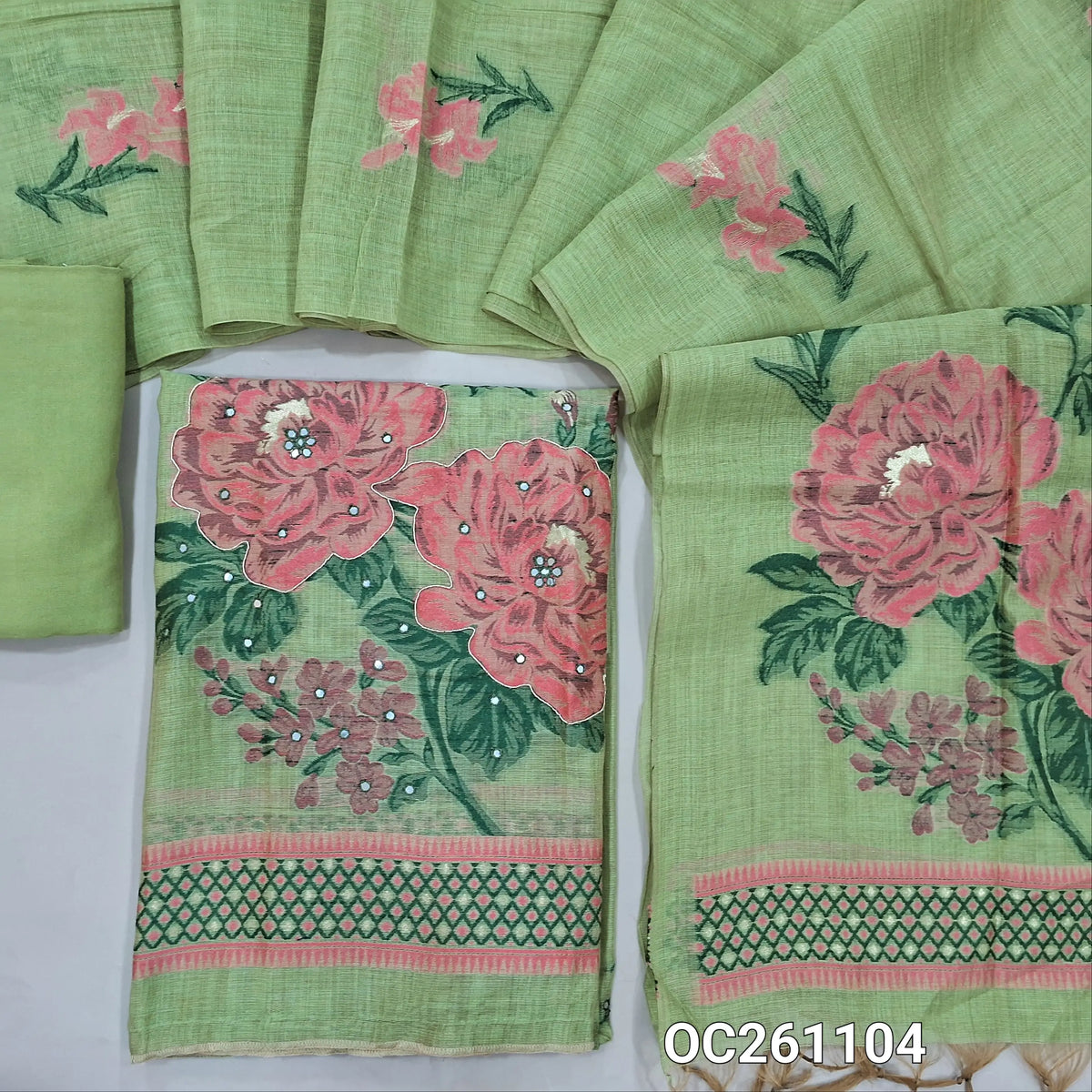 Light green silk cotton unstitched salwar material,thread weaving with zarodzi and sequins work on front(lining needed)santoon bottom, full length silk cotton dupatta with rich weaving work on corner. OC261104