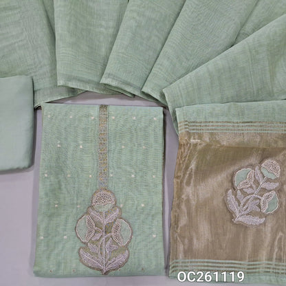 Pastel green silk cotton unstitched salwar material,applique work and zari yoke, zari buttas all over,rich daman,(lining needed)santoon bottom,silk cotton dupatta with tissue pallu with applique work. OC261119