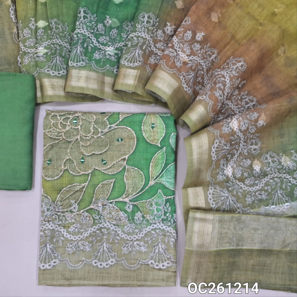 Dark & light green dual shaded premium semi linen unstitched salwar material, digital prints with zari & real mirror work on daman,(Textured, Lining Needed)matching santoon bottom, zari buttas and printed premium semi linen dupatta with borders. OC261215