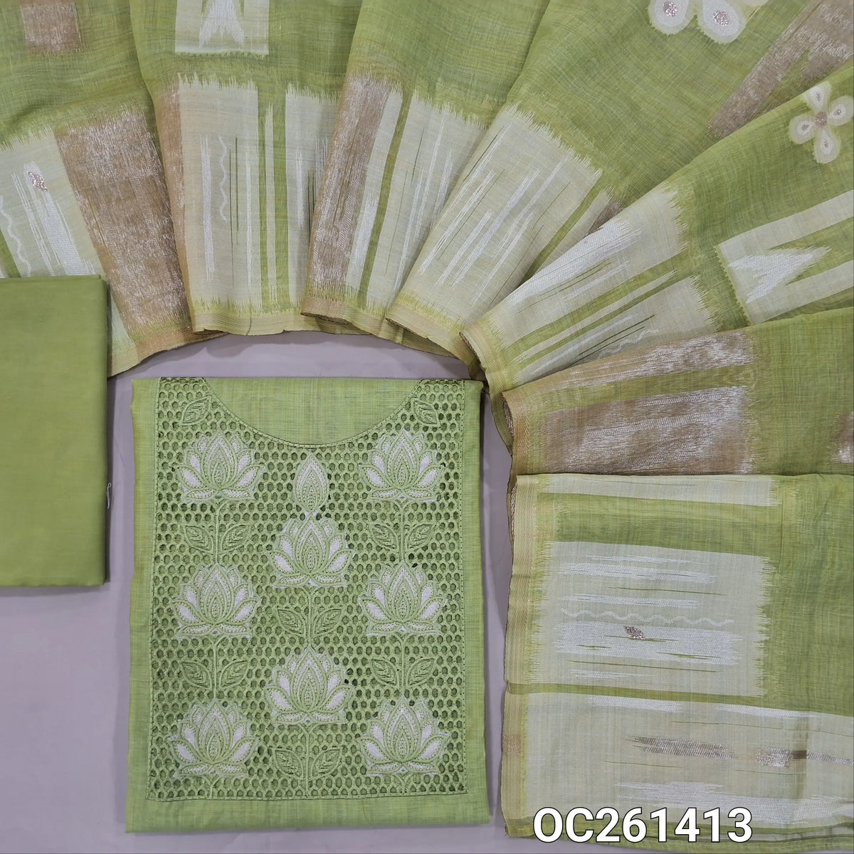 Pastel green premium silk cotton unstitched salwar material, cut work and applique work on yoke, (soft, lining needed)silky bottom,jamdani woven silk cotton dupatta. OC261413