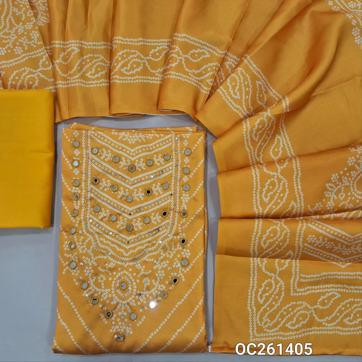Mango yellow bandhini printed premium satin silk unstitched salwar material, real mirror and sequins on yoke,(lining needed)spun cotton bottom, bandhini printed  satin silk dupatta. OC261405