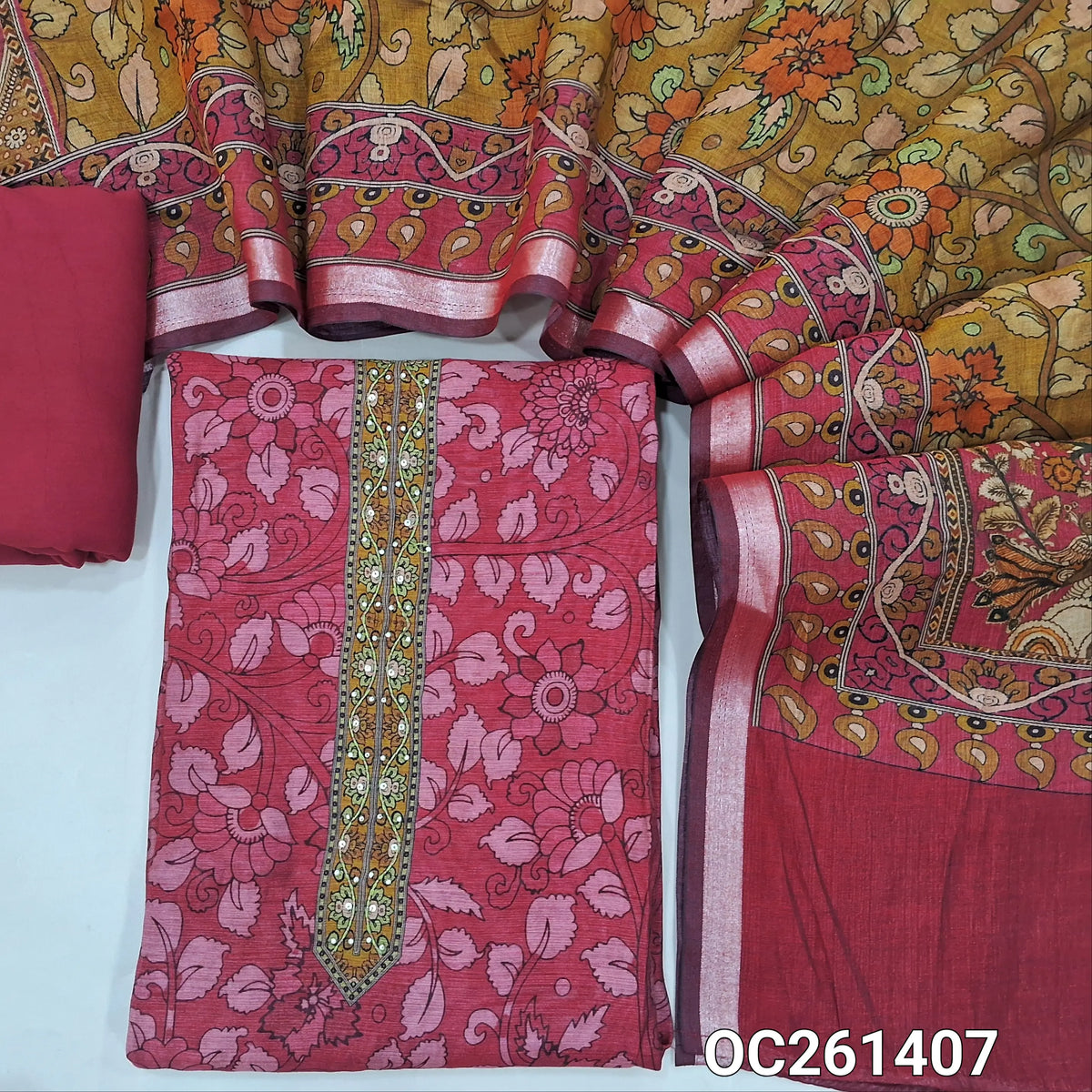 Dark pink chanderi silk cotton unstitched salwar material,printed yoke with pearl bead & sequins,kalamkari printed all over,(lining needed)spun cotton bottom, kalamkari printed chanderi silk cotton dupatta with pallu & tissue borders. OC261407
