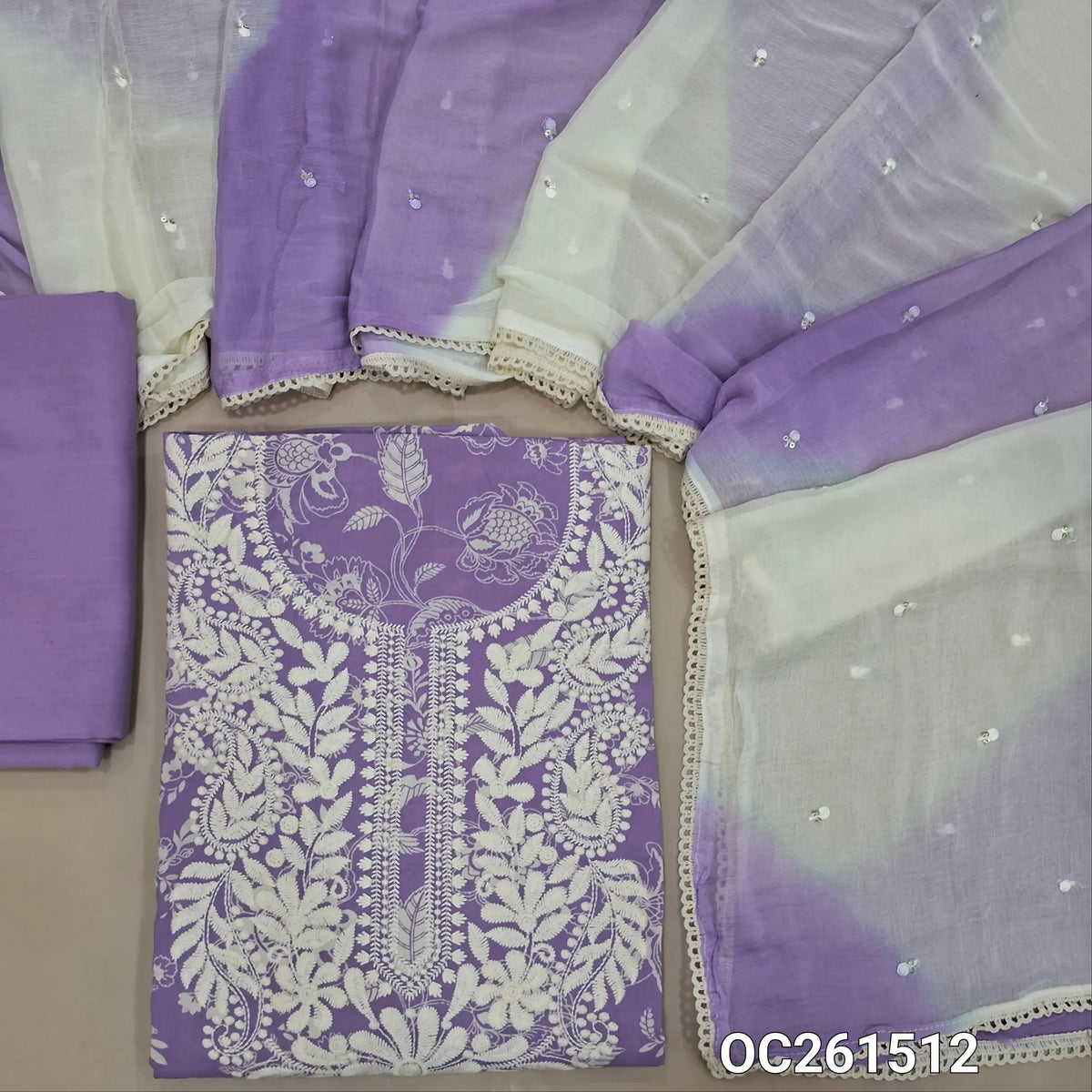 Lavender soft pure cotton unstitched salwar material, chikankari embroidery on yoke,printed all over,(Soft, Lining Needed)cotton bottom, thread and sequins work on dual shaded fancy chiffon dupatta with lace tapping. OC261512