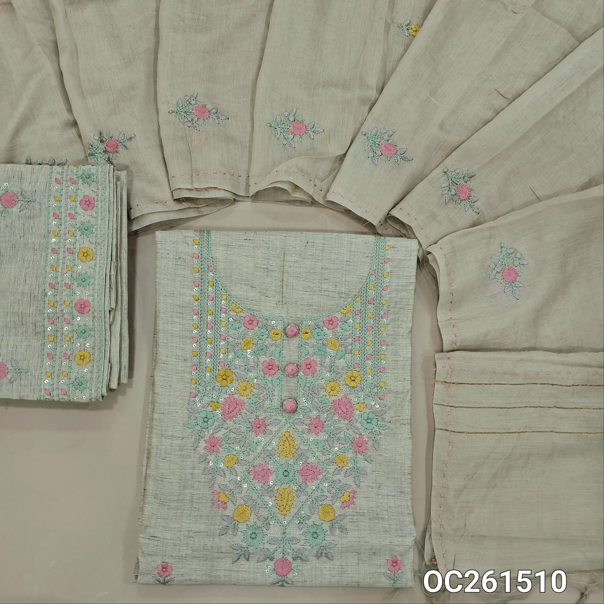 Light grey slub silk cotton unstitched salwar material,embroidery work on yoke,( lining needed) embroidered slub silk cotton bottom, embroidery work on silk cotton dupatta. OC261510