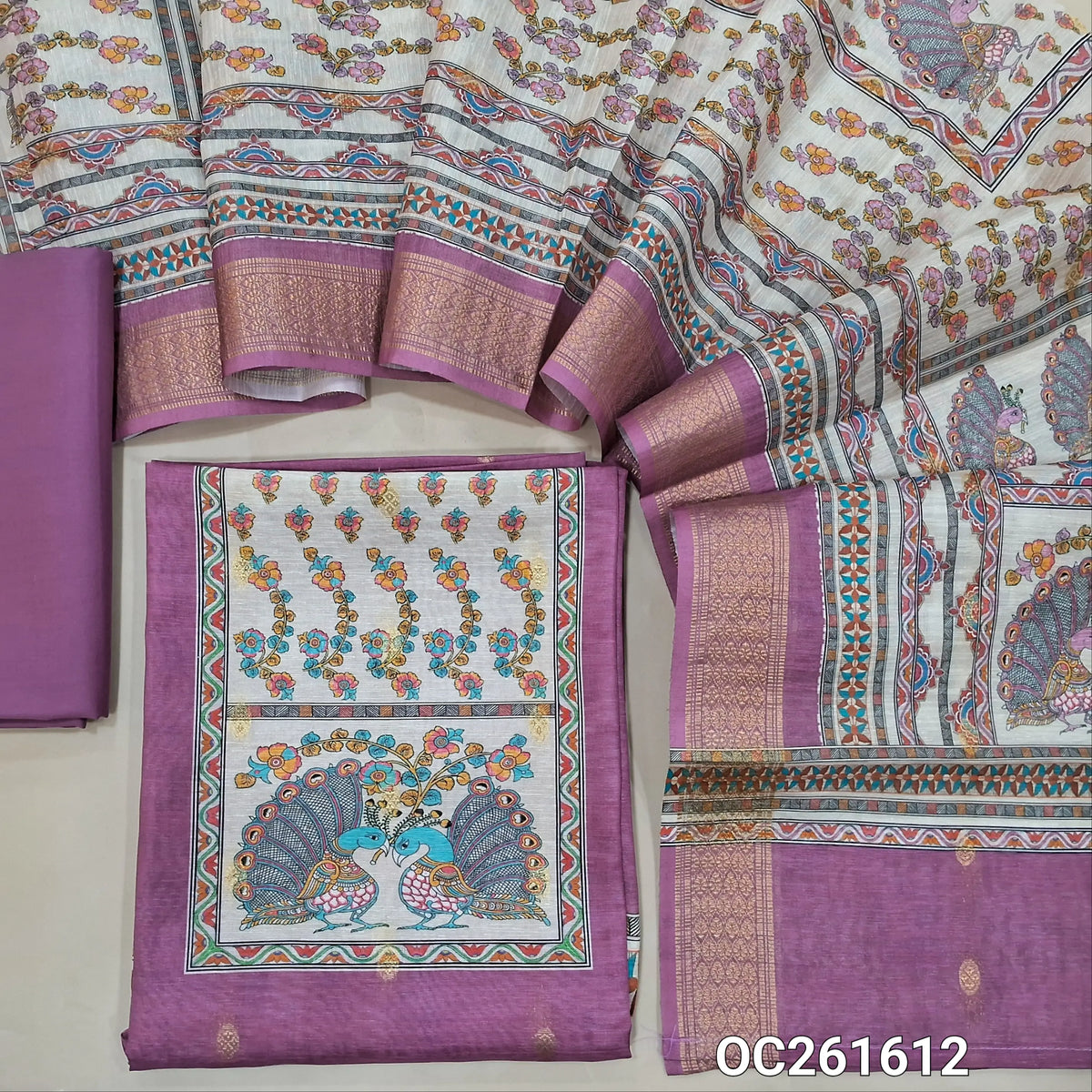 Pink shade digital printed silk cotton unstitched salwar material, peacock printed yoke,zari buttas all over,(lining needed)cotton bottom, digital printed silk cotton dupatta with zari woven borders. OC261612
