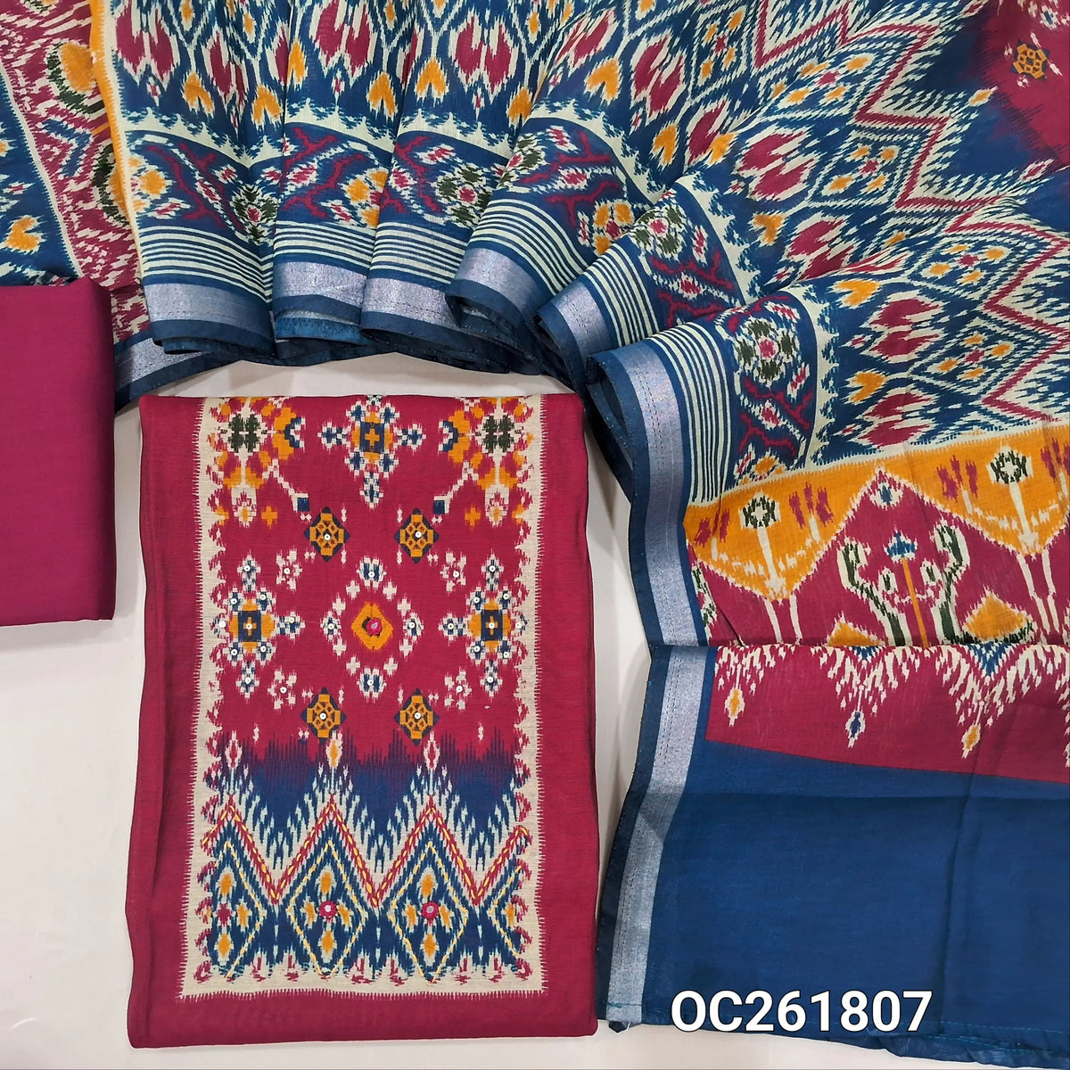 Dark pink & royal blue chanderi silk cotton unstitched salwar material, patola printed yoke with kantha stitch & mirror work,(lining needed)spun cotton bottom, digital printed full length premium chanderi silk cotton dupatta with tissue borders. OC261807