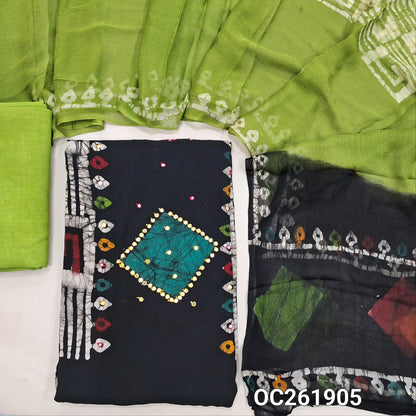 Black base multicoloured wax batik dyed premium satin cotton unstitched salwar material, faux mirror work all over,panel design(lining needed)light green spun cotton bottom, batik design on chiffon dupatta with contrast pallu. OC261905