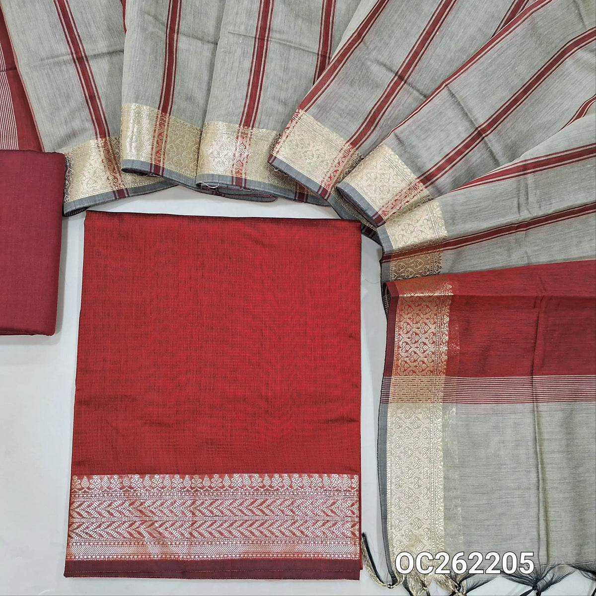 Reddish maroon semi Maheshwari silk cotton unstitched salwar material, antic gold zari daman, (lining needed) silk cotton bottom,printed stripes on silk cotton dupatta with zari borders. OC262205