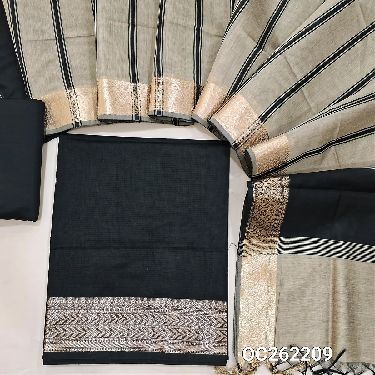 Black semi Maheshwari silk cotton unstitched salwar material, antic gold zari daman, (lining needed) silk cotton bottom,printed stripes on silk cotton dupatta with zari borders. OC262209