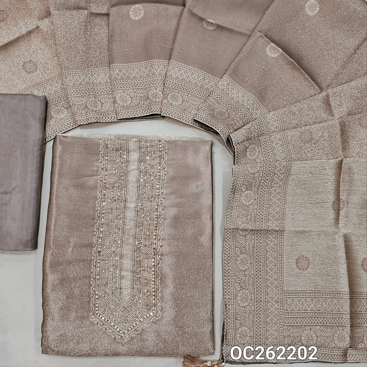 Light mauve with golden tint premium tissue unstitched salwar material,zarodzi and sequins on yoke,zari woven daman,(Shimmer, Lining Needed)premium silk bottom, buttas on dual shaded benarasi tissue dupatta with borders(DRY CLEAN ONLY). OC262202