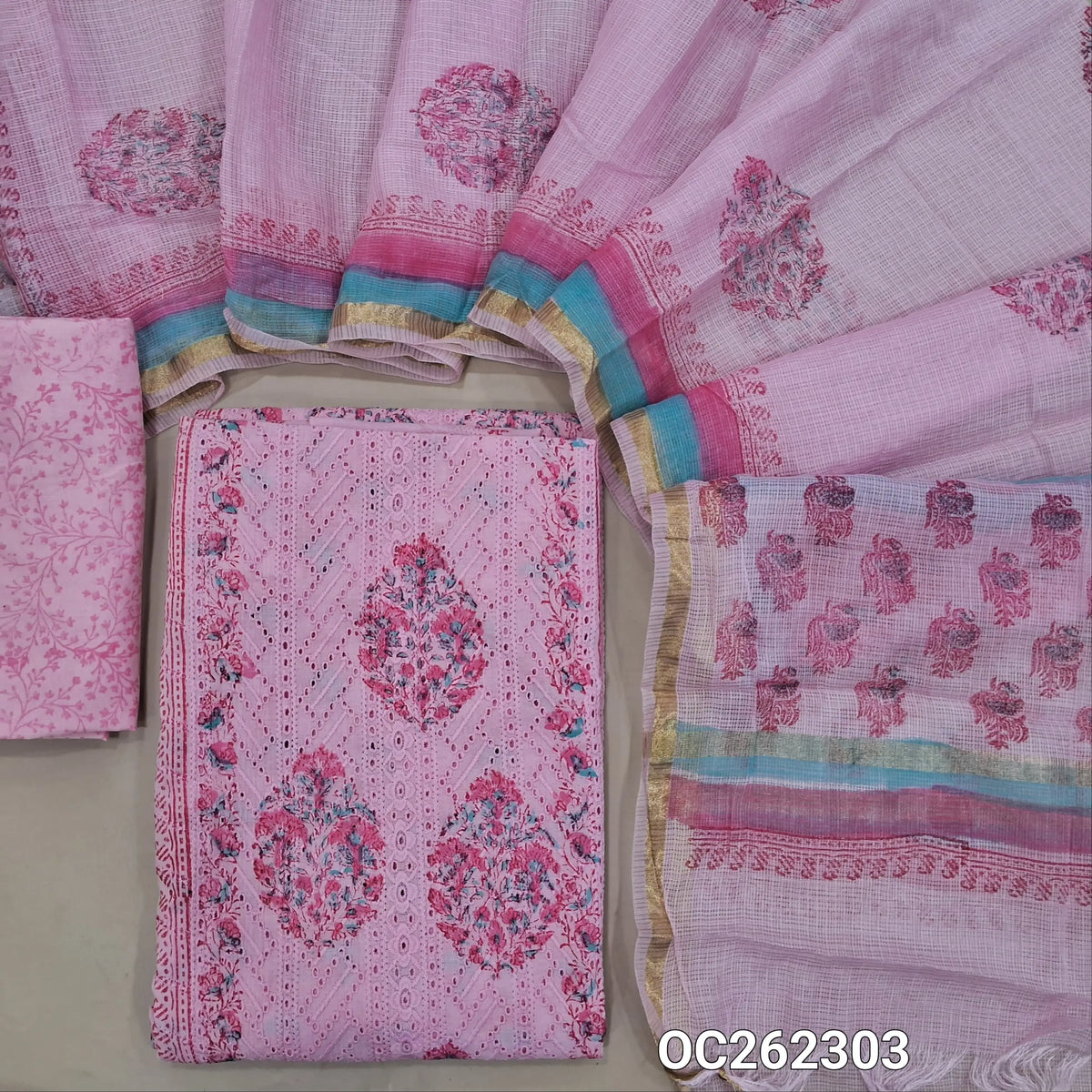 Pastel pink block printed soft cotton unstitched salwar material, panel design,chikankari embroidery with cutwork on front,(lining needed)block printed mul cotton bottom, block printed kota dupatta with tissue borders. OC262303