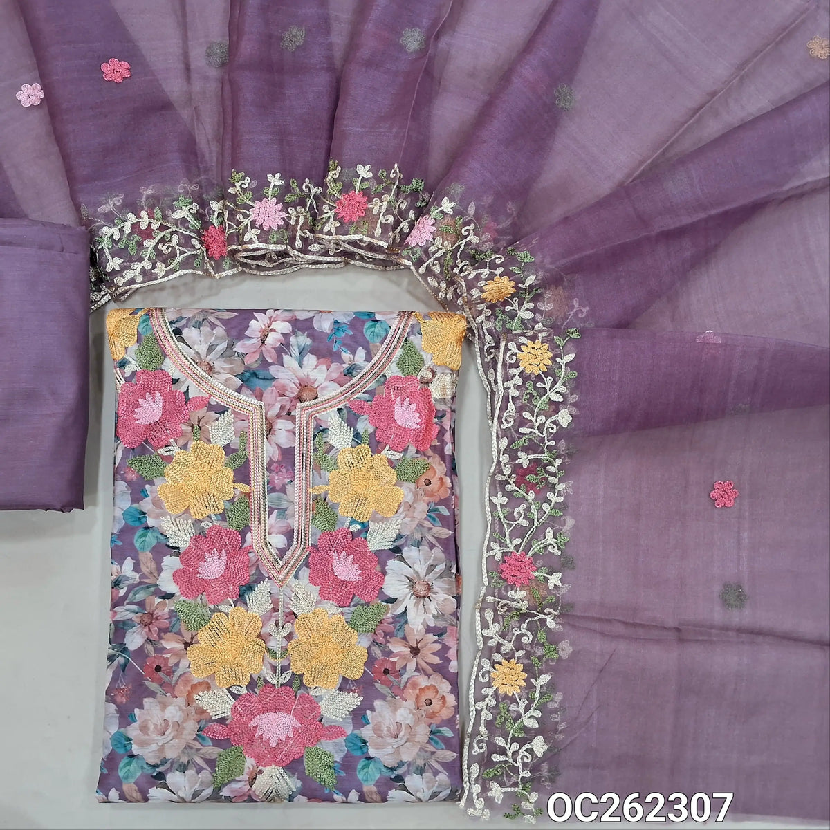 Light purple digital printed premium silk cotton unstitched salwar material,thread embroidery on yoke,(lining needed)matching siky fabric provided for both bottom and lining,organza dupatta with embroidery borders. OC262307
