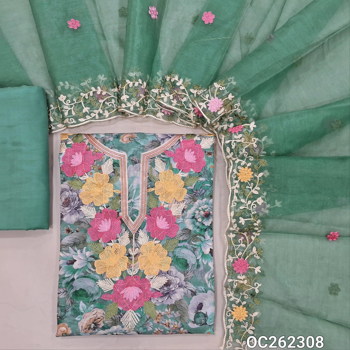 Green digital printed premium silk cotton unstitched salwar material,thread embroidery on yoke,(lining needed)matching siky fabric provided for both bottom and lining,organza dupatta with embroidery borders. OC262308