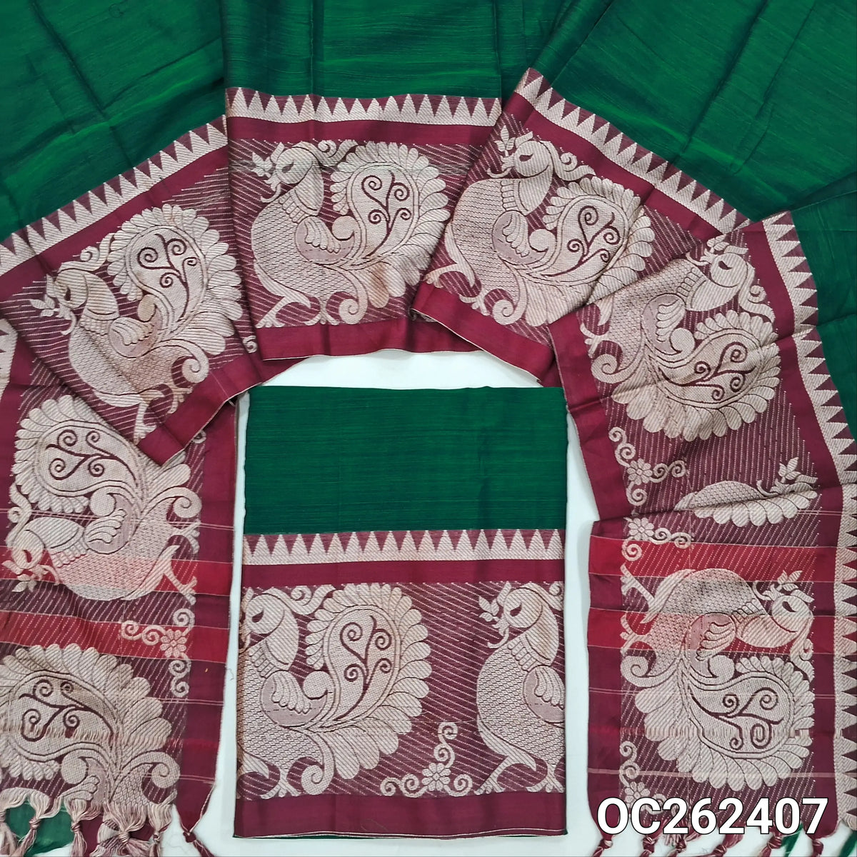 Bottle green pure mercerized handloom cotton unstitched salwar material, peacock weaving design on daman,(lining needed)bottom included with top,full length pure mercerized handloom cotton dupatta with borders. OC262407